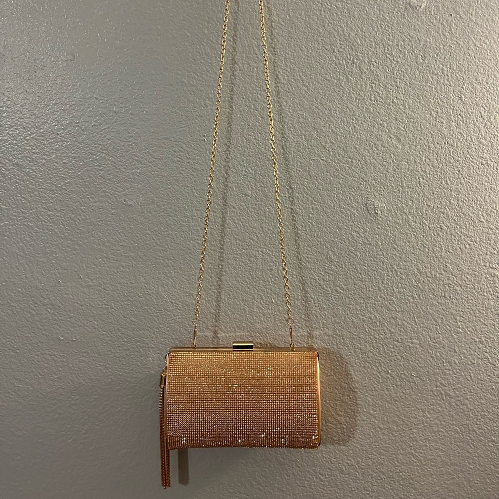 Rose gold clutch purse can convert to hand held clutch as well